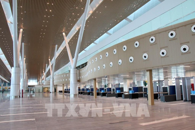 La terminal 3 en el Aeropuerto Internacional de Tan Son Nhat, en Ciudad Ho Chi Minh. (Fuente: VNA) 091859-hanh-trinh-hon-2-nam-xay-dung-nha-ga-t3-san-bay-tan-son-nhat.jpg