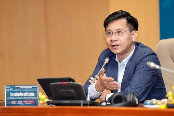 El jefe del Departamento de Seguridad de Instituciones Crediticias del Banco Estatal de Vietnam, Nguyen Duc Long, compartió su opinión en el seminario. (Fuente: Vietnamplus) z6510029991802-139e73eed5e60ed378754eb901aec753.jpg