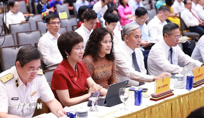 Los participantes en la conferencia de balance (Foto: VNA) thu-tuong-chu-tri-hoi-nghi-tong-ket-chuong-trinh-va-phong-trao-thi-dua-ca-nuoc-chung-tay-xoa-nha-tam-nha-dot-nat-8235139.jpg