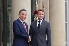 El 7 de octubre de 2024, en el Palacio del Elíseo en París, el secretario general del Partido y Presidente de Vietnam, To Lam, asistió a la ceremonia oficial de bienvenida encabezada por el presidente Emmanuel Macron. (Foto: VNA)