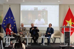 En una sesión de debate del evento (Fuente: VNA)