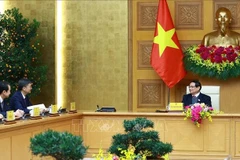 El primer ministro de Vietnam, Pham Minh Chinh, recibe a Chen Gang, secretario del Comité del Partido Comunista de China en Guangxi. (Fuente: VNA)