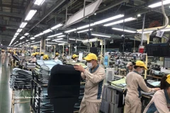 La producción en la empresa Toyota Boshoku Hanoi (Fuente: VNA) 