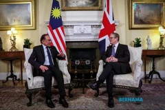 El primer ministro de Malasia, Datuk Seri Anwar Ibrahim (izquierda), y su homólogo británico, Keir Starmer. (Foto: Bernama)