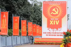 Pancartas y lemas, pintados de un rojo vibrante, adornan las calles de Hanoi, dando la bienvenida al XIV Congreso Nacional del Partido Comunista de Vietnam. (Foto: VNA)