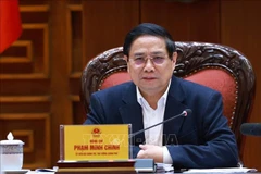 El primer ministro Pham Minh Chinh, secretario del Comité del Partido Comunista en el Gobierno, preside la reunión (Fuente: VNA) 