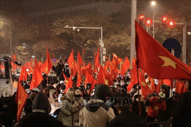 Aficionados celebran la victoria de la selección sub-23. Foto: VNA