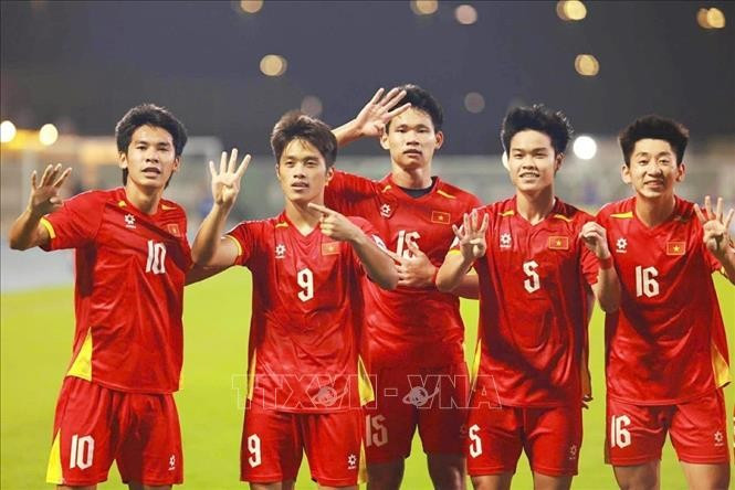 Jugadores vietnamitas celebran la victoria contra Corea del Sur. Foto: VNA