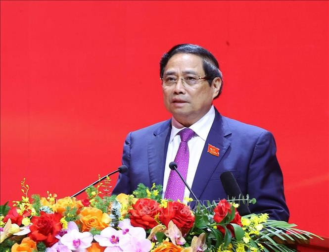 El miembro del Buró Político, secretario del Comité partidista del Gobierno y primer ministro Pham Minh Chinh, habla en la reunión. (Foto: VNA)