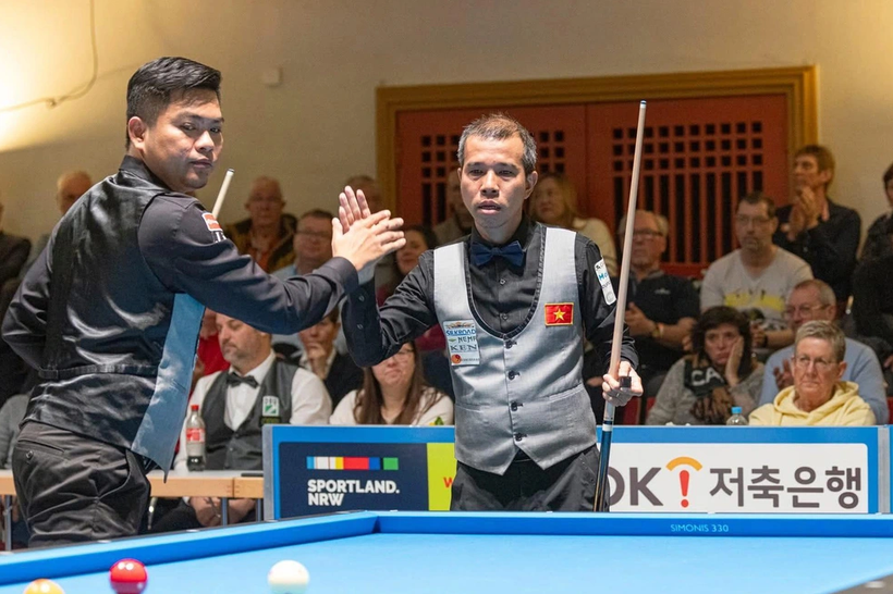 Tran Quyet Chien (derecha) y Nguyen Tran Thanh Tu, campeones mundiales por equipos en 2026 (Foto: UMB).