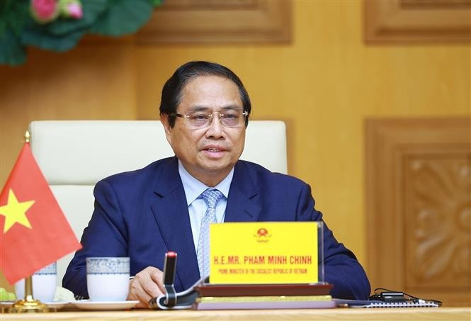 El primer ministro Pham Minh Chinh habla en la cumbre. (Foto: VNA)