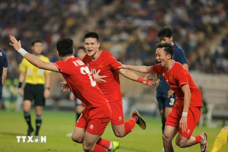 Jugadores vietnamitas celebran la victoria. (Foto: VNA)