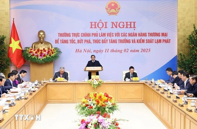 El primer ministro de Vietnam, Pham Minh Chinh, habla en la reunión. (Foto: VNA)