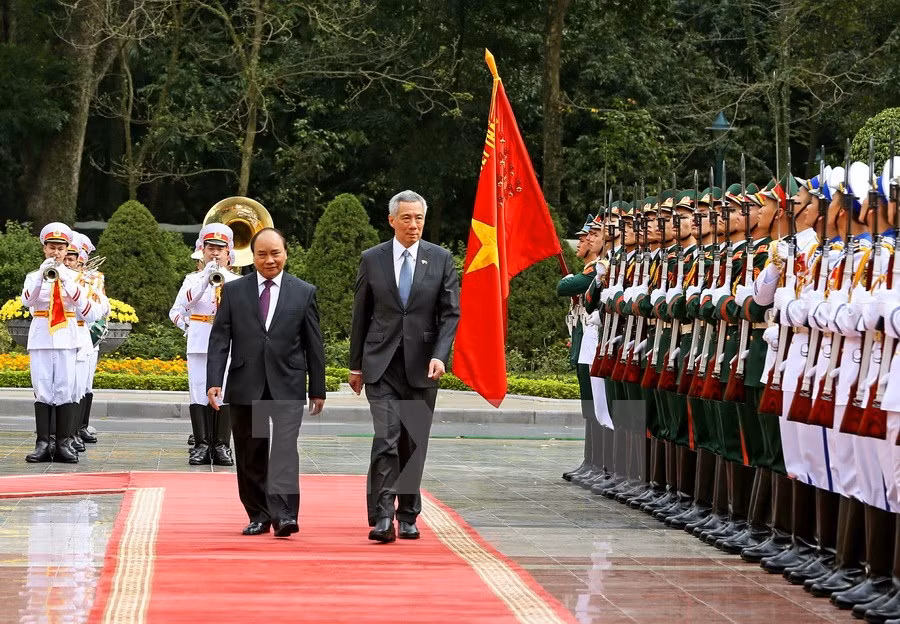 La recepción oficial al primer ministro de Singapur, Lee Hsien Loong. (Foto:VNA)