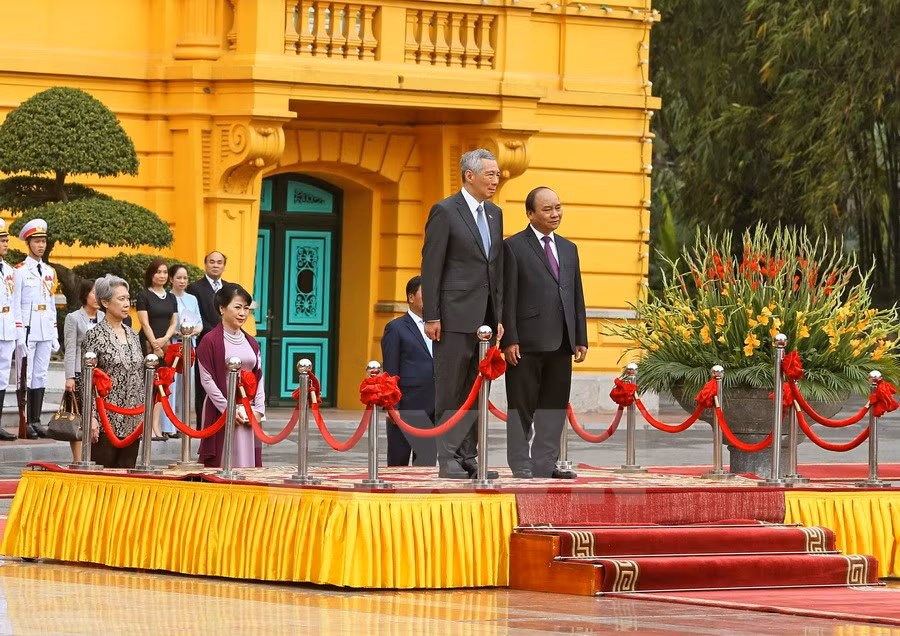 La recepción oficial al primer ministro de Singapur, Lee Hsien Loong. (Foto:VNA)
