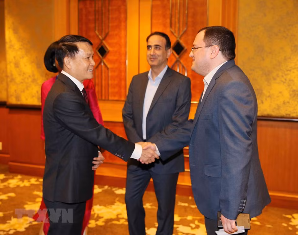 Director general de la VNA, Nguyen Duc Loi, da la bienvenida a los delegados extranjeros. (Foto: VNA)