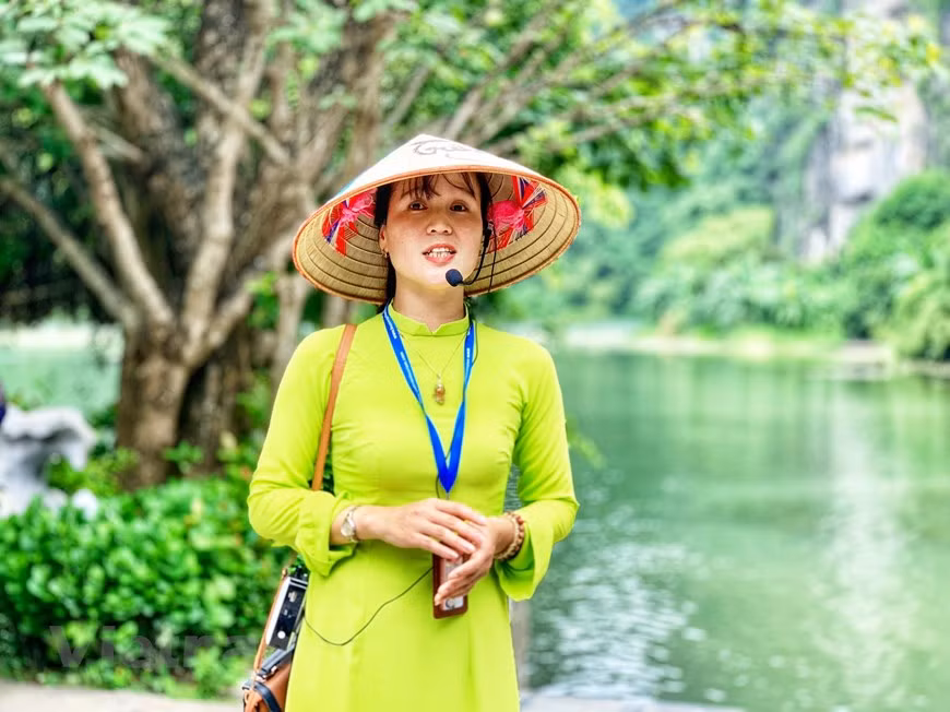 Una guía turística (Foto: Vietnamplus)