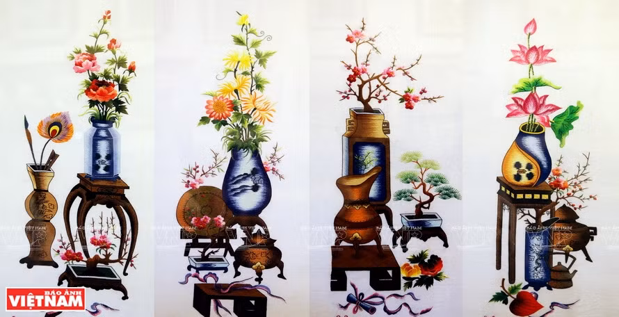 Pintura de bordado de artísta de la aldea de Quat Dong. (Foto: VNA)