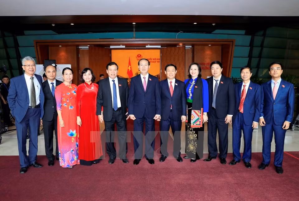 El presidente, Tran Dai Quang, y algunos delegados (Fuente: VNA)