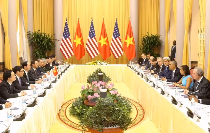 El presidente Tran Dai Quang dialoga con el visitante (Fuente: VNA)