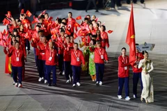 La delegación vietnamita en la inauguración de SEA Games 33. (Foto: VNA)