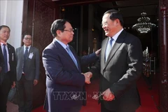El primer ministro de Vietnam, Pham Minh Chinh, (izquierda) y su homólogo de Laos, Sonexay Siphandone (Foto: VNA)