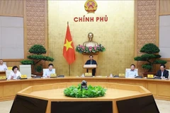 El primer ministro de Vietnam, Pham Minh Chinh, en la reunión gubernamental sobre la implementación del modelo de gobierno local de dos niveles. (Foto: VNA)