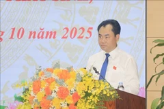 Trinh Viet Hung, secretario del Comité del Partido en Lao Cai, es designado presidente del Consejo Popular provincial. (Foto: VNA)