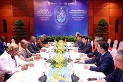 El ministro de Seguridad Pública de Vietnam, general Luong Tam Quang, en reunión con el ministro del Interior de Mozambique, Paulo Chachine. (Foto: VNA)
