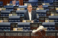 El ministro de Comunicaciones de Malasia, Datuk Fahmi Fadzil. (Foto: VNA)