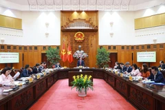 El primer ministro de Vietnam, Pham Minh Chinh, en su calidad de jefe del Comité Directivo Nacional para la Inclusión Financiera, preside la tercera reunión del organismo. (Foto: VNA)