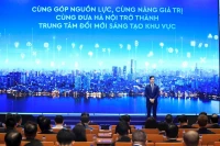 Tran Quang Hung, presidente del Consejo de Administración del HIC, presenta el modelo de operación del HIC (Foto: Hanoimoi)