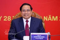 El primer ministro Pham Minh Chinh se dirige a la sesión de trabajo con la Academia de Administración Pública y Gobernanza (APAG). (Foto: VNA)