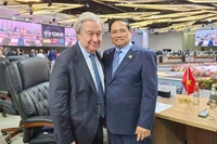 El primer ministro de Vietnam, Pham Minh Chinh, y el secretario general de las Naciones Unidas, António Guterres. (Foto: VNA)