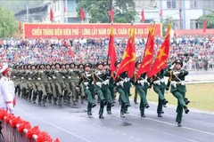 El desfile del Bloque de Soldados de Dien Bien Phu en el mitin, desfile y marcha en conmemoración al 70 aniversario de la Victoria de Dien Bien Phu (7 de mayo). (Fuente: VNA)