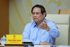 El primer ministro Pham Minh Chinh habla en el evento. (Fuente: VNA)