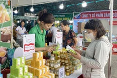 Clientes compran en el Centro MM Mega Market Thang Long. (Foto: hanoimoi.vn)
