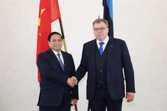 El primer ministro de Vietnam, Pham Minh Chinh, y el presidente de la Asamblea Estatal (Parlamento) de Estonia, Lauri Hussar. (Fuente: VNA)