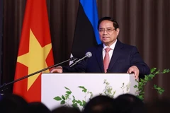 El primer ministro de Vietnam, Pham Minh Chinh, habla en el evento. (Fuente: VNA)