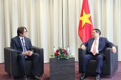 El primer ministro vietnamita, Pham Minh Chinh, recibió a Jevgeni Kabanov, presidente de grupo Bolt. (Foto: VNA)