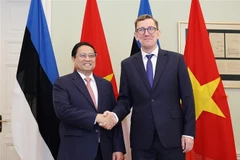 El primer ministro de Vietnam, Pham Minh Chinh, y su homólogo estonio, Kristen Michal. (Fuente: VNA)