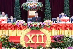 El secretario general del Partido Popular Revolucionario de Laos y presidente del país, Thongloun Sisoulith, pronuncia el discurso de clausura del XII Congreso del Partido. (Fuente: VNA)