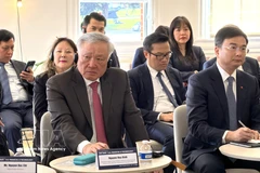 El viceprimer ministro permanente de Vietnam, Nguyen Hoa Binh. en el coloquio. (Fuente: VNA)
