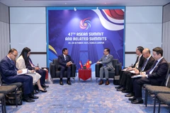 El ministro de Relaciones Exteriores de Vietnam, Le Hoai Trung, se reúne con el vicepremier y ministro camboyano de Relaciones Exteriores, Prak Sokhonn. (Fuente: VNA)