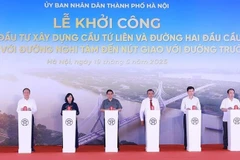 El primer ministro Pham Minh Chinh y delegados en la inauguración. (Fuente: VNA)