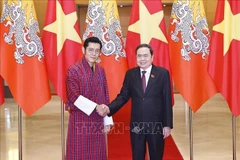 El presidente de la Asamblea Nacional de Vietnam, Tran Thanh Man, y el Rey Jigme Khesar Namgyel Wangchuck de Bután. (Fuente: VNA)