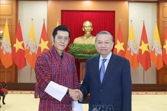 El secretario general del Partido Comunista de Vietnam, To Lam, recibe al rey de Bután, Jigme Khesar Namgyel Wangchuck. (Fuente: VNA)