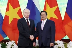 El primer ministro vietnamita, Pham Minh Chinh, y el presidente de Rusia, Vladimir Putin. (Fuente: VNA)