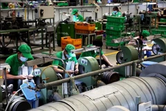 La Zona de Procesamiento de Exportación de Tan Thuan se conecta con el Puerto de Tan Thuan para formar un ecosistema de producción y exportación en Ciudad Ho Chi Minh. (Foto: VNA)