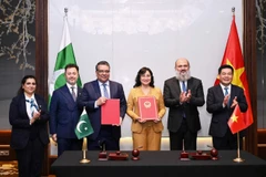El encuentro fue copresidido por la viceministra vietnamita de Industria y Comercio, Phan Thi Thang, y el secretario adjunto del Ministerio de Comercio de Pakistán, Nasir Hamid. (Fuente: VNA)